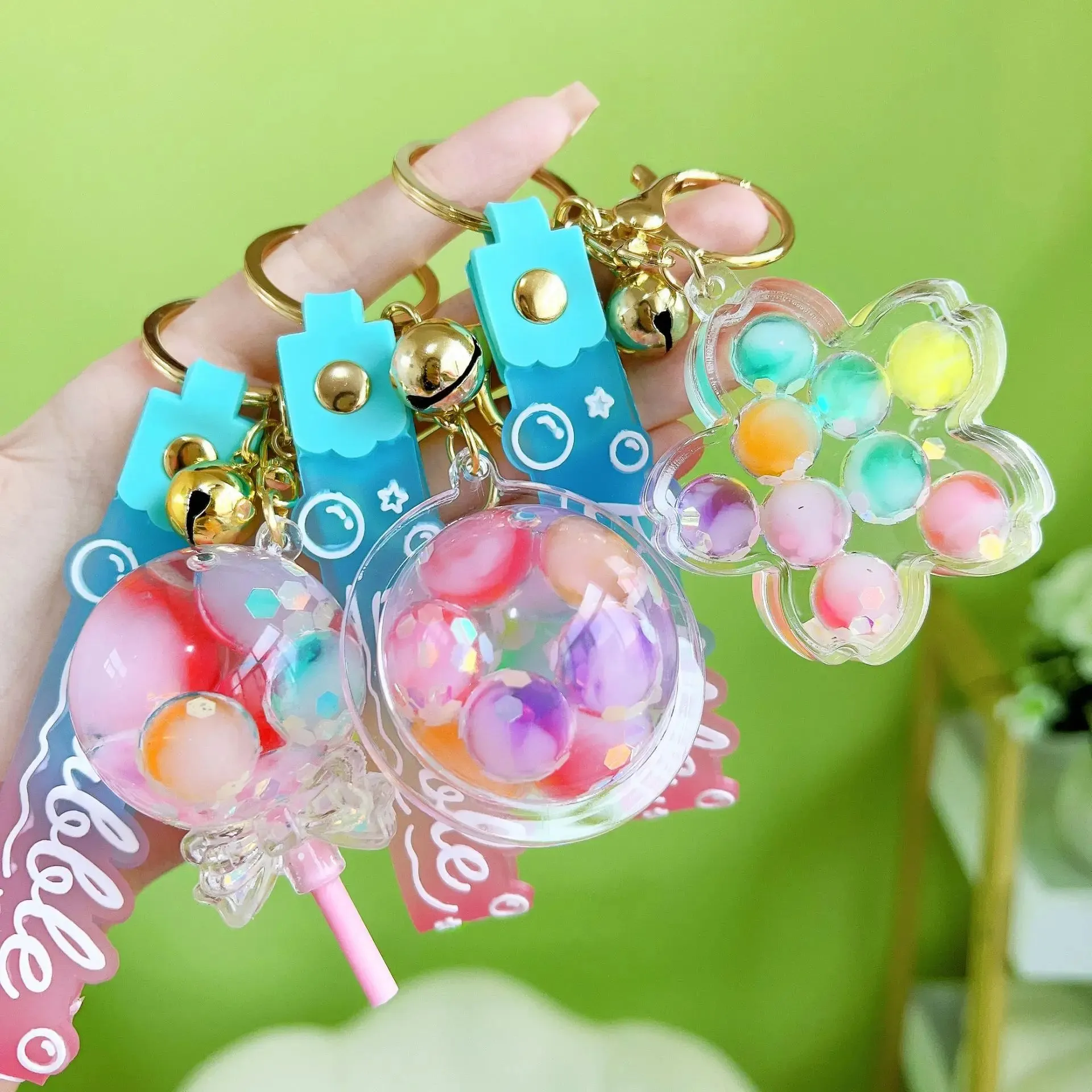 ✨ Adorable Luminous Bubble Beads Keychain 🍬 Cute Quicksand Cherry Blossom Lollipop Pendant for Trendy Bags 🎀 Perfect Gift for All!