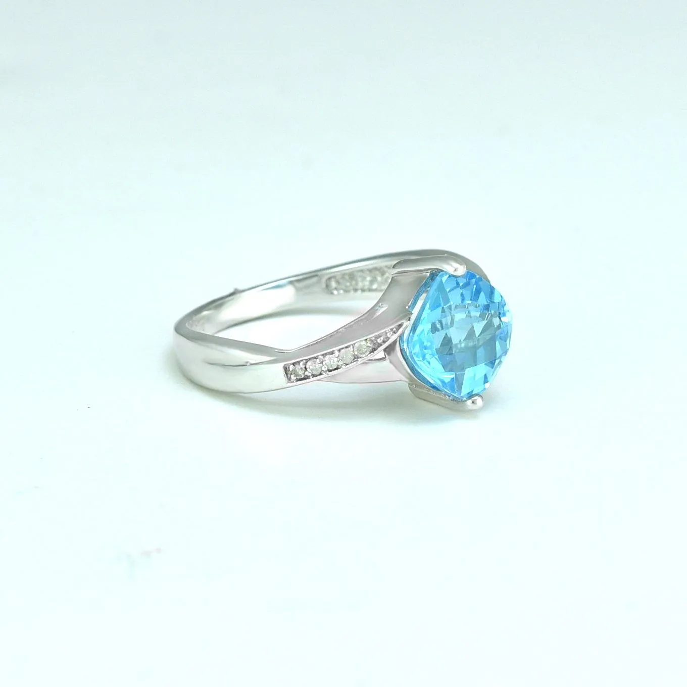 Blue Topaz and Diamond Fashion Ring in Sterling Silver