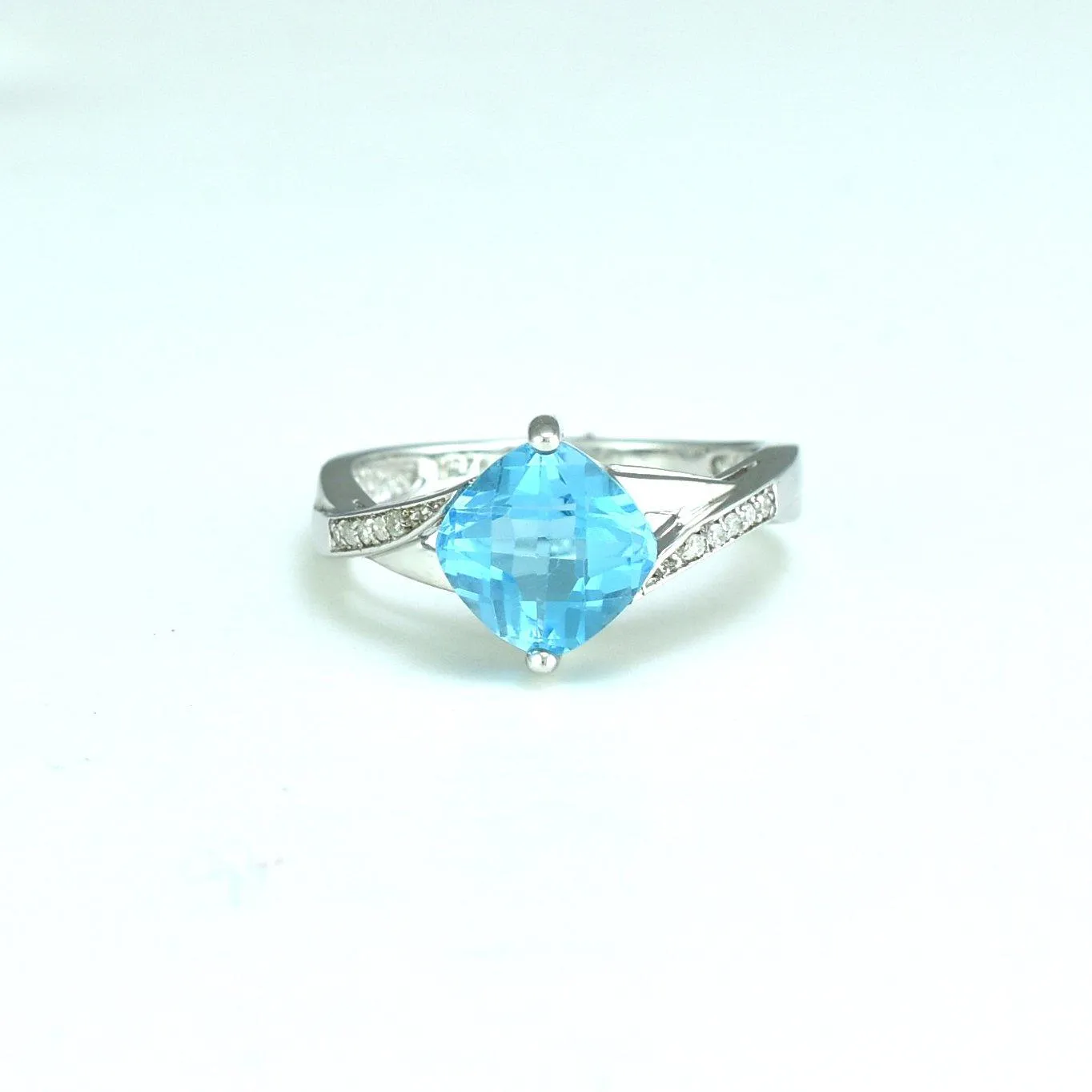 Blue Topaz and Diamond Fashion Ring in Sterling Silver