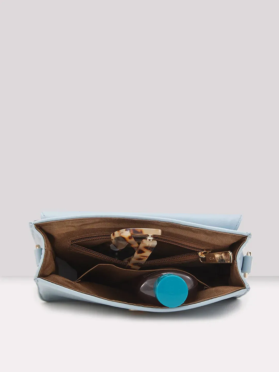 Caprese Emily In Paris Printed Medium Soft Blue Sling Bag