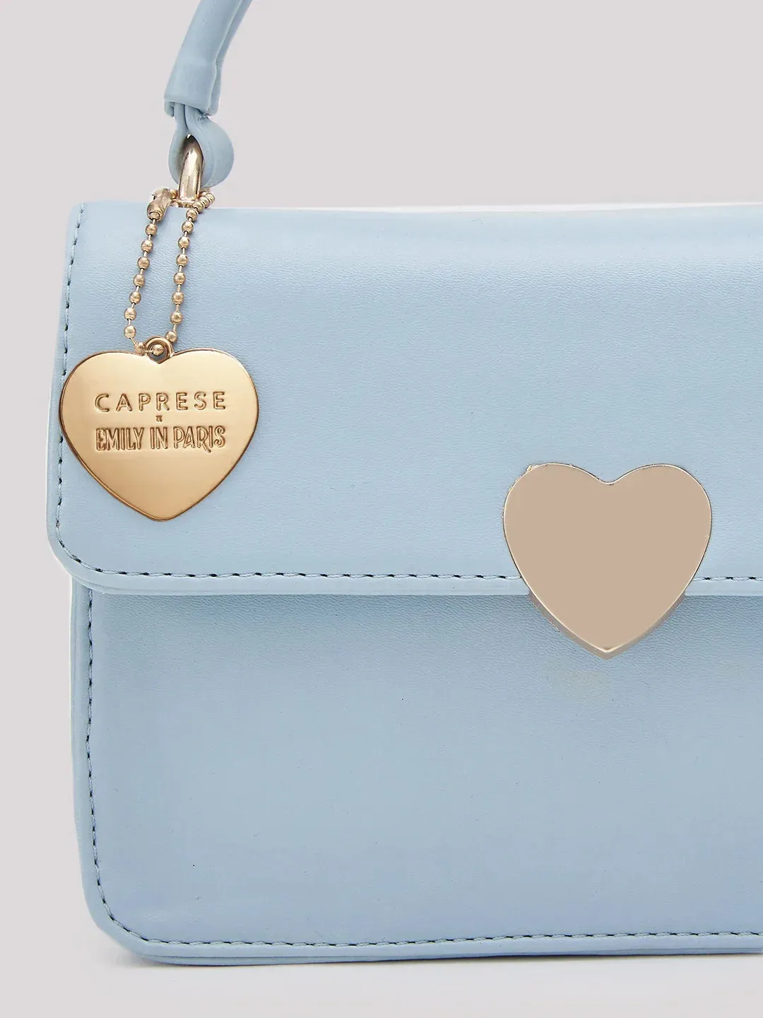 Caprese Emily In Paris Printed Medium Soft Blue Sling Bag