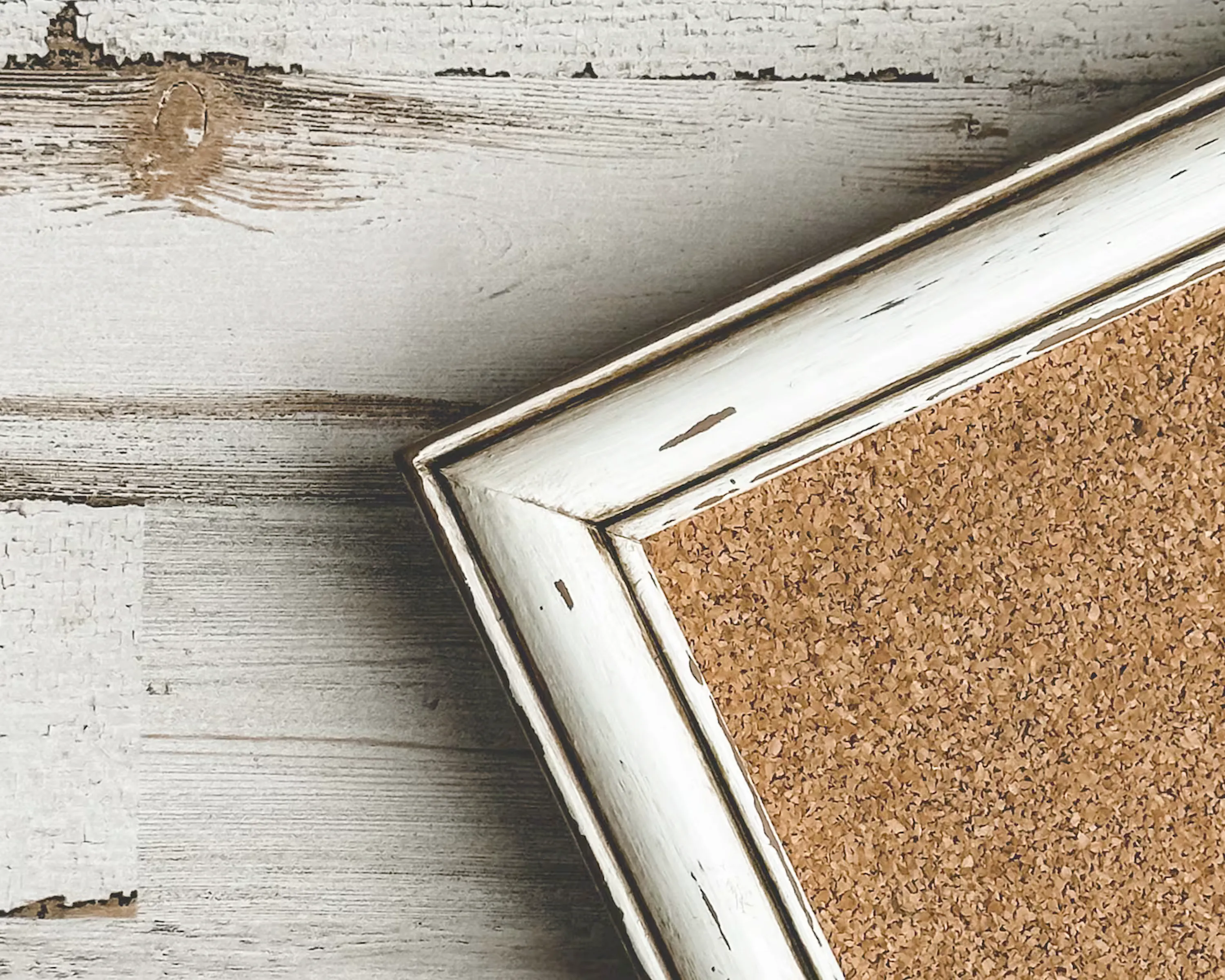 Framed antique white distressed cork board