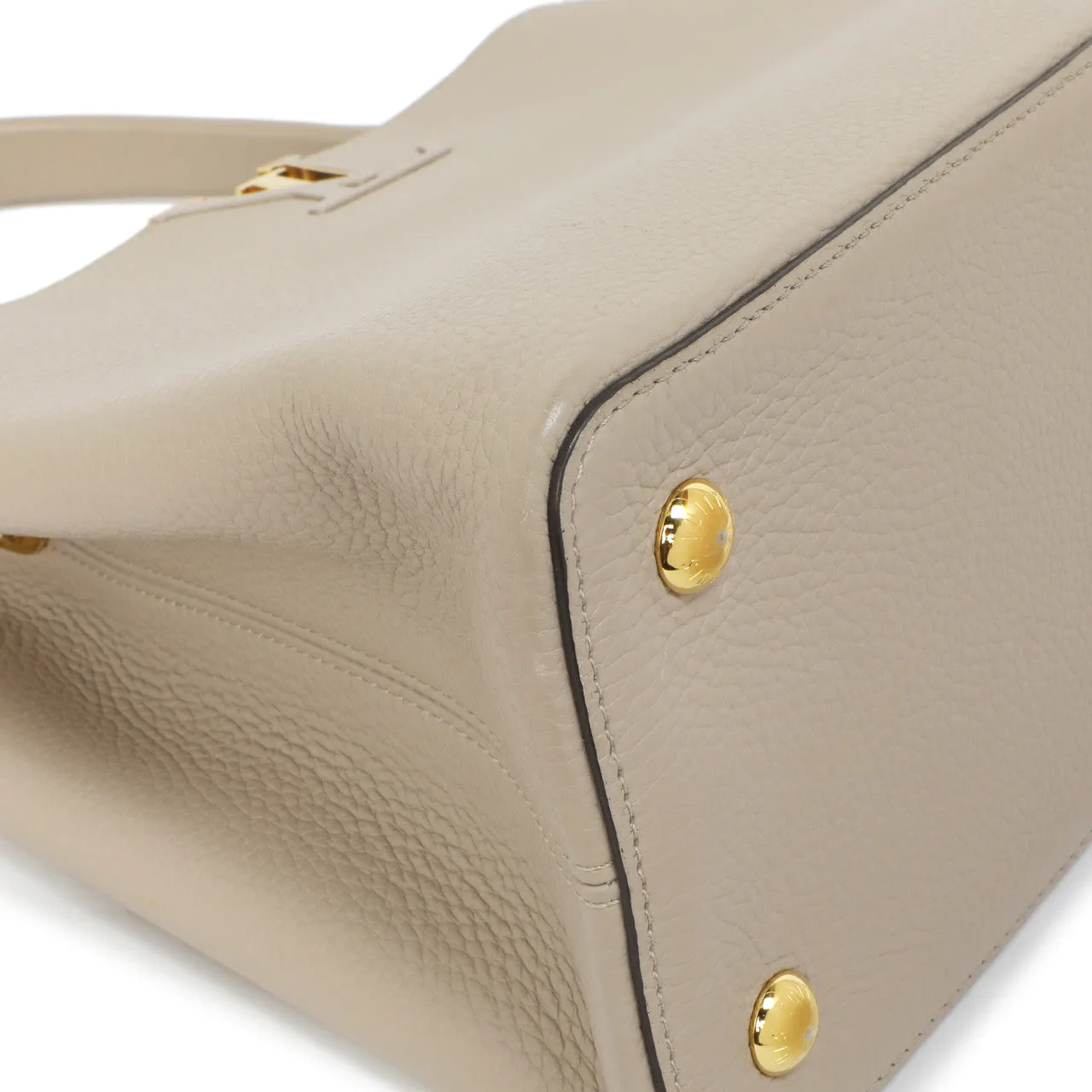 Louis Vuitton Galet Taurillon Leather Capucines MM