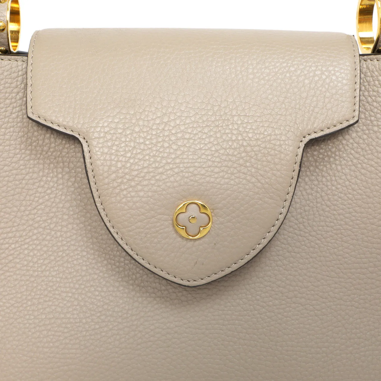 Louis Vuitton Galet Taurillon Leather Capucines MM