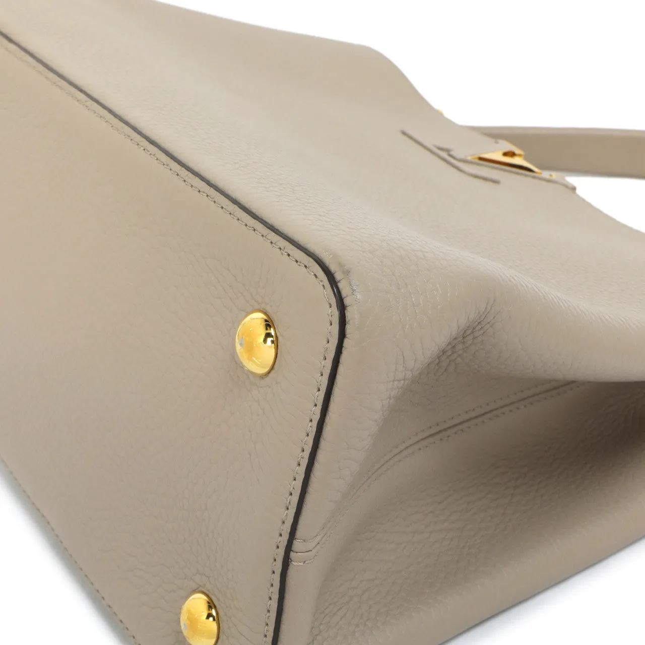Louis Vuitton Galet Taurillon Leather Capucines MM